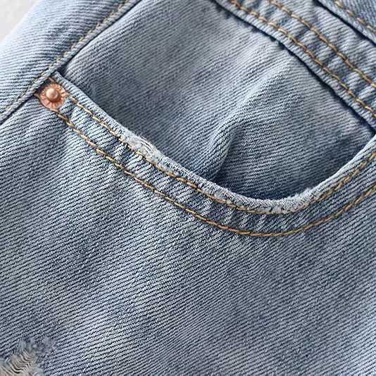 Vintage Washed Distressed Notched Light Denim Mini Skirt